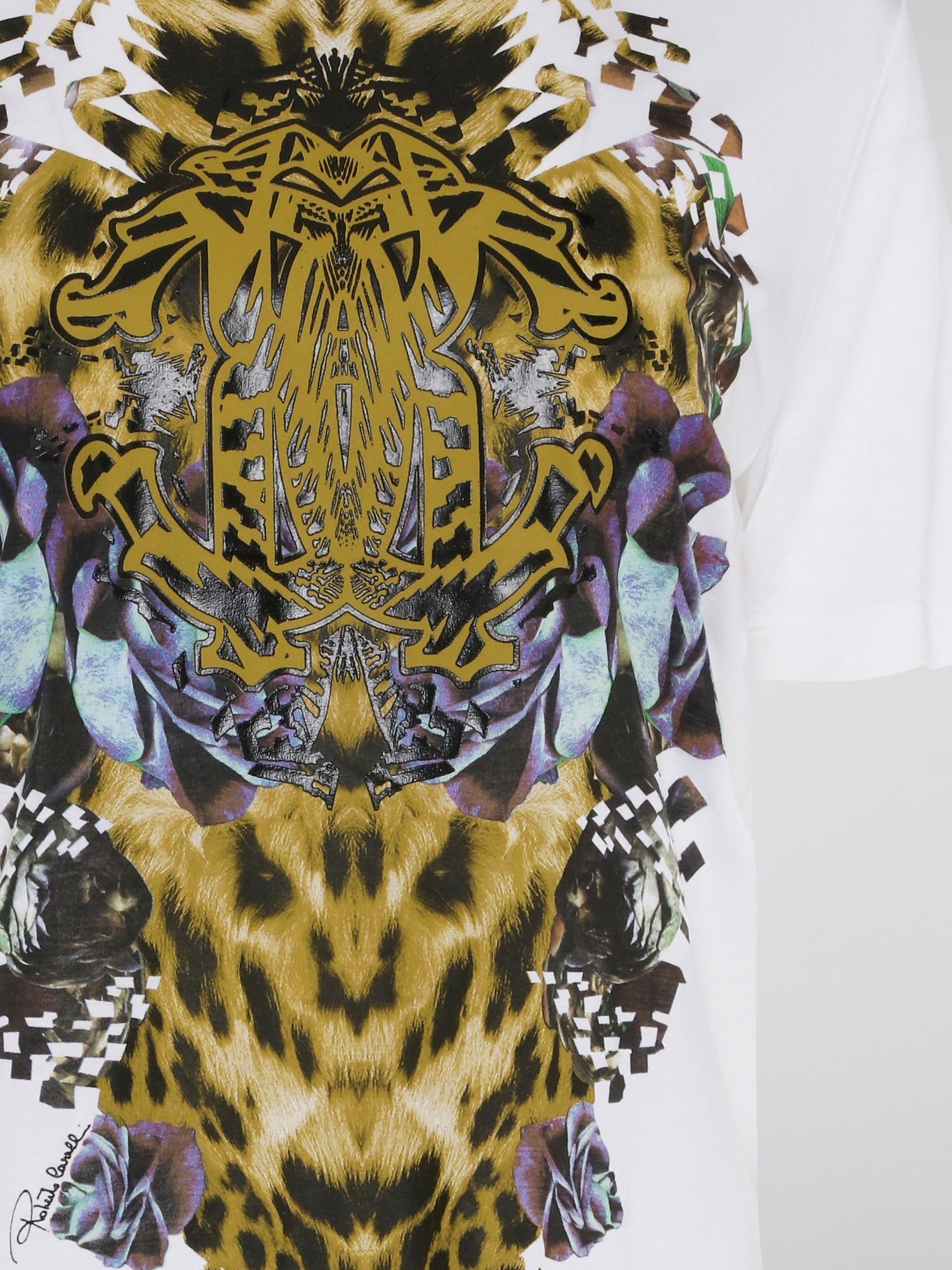 Elevate your casual style with the White Printed Oversized T-Shirt from Roberto Cavalli. Made with premium cotton fabric, this tee features a bold and eye-catching print that will set you apart from the crowd. Whether you dress it up with heels or keep it cool with sneakers, this statement piece is a must-have for your wardrobe.