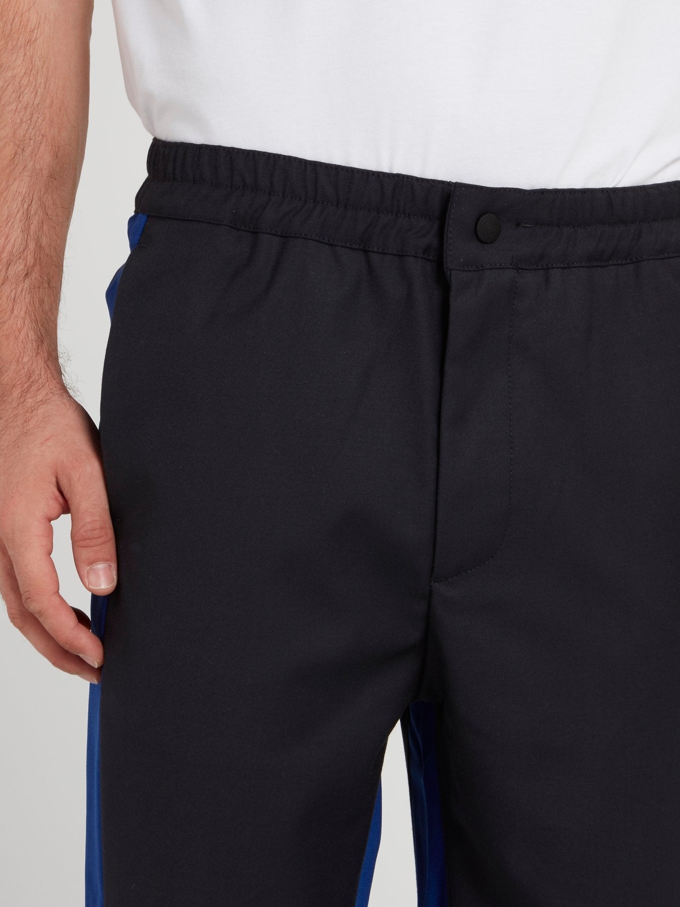 Темно-синие брюки на резинке с лампасами