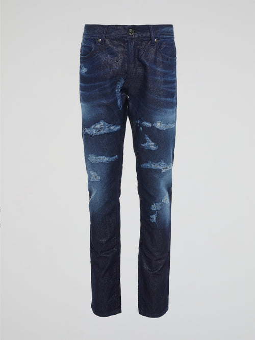 Experience the ultimate in denim luxury with our Navy Distressed Slim Fit Jeans by Roberto Cavalli. Crafted with precision and attention to detail, these jeans are a work of art, combining edgy distressing with a sleek slim fit silhouette. Make a bold fashion statement with these versatile jeans that will take you from day to night in style.