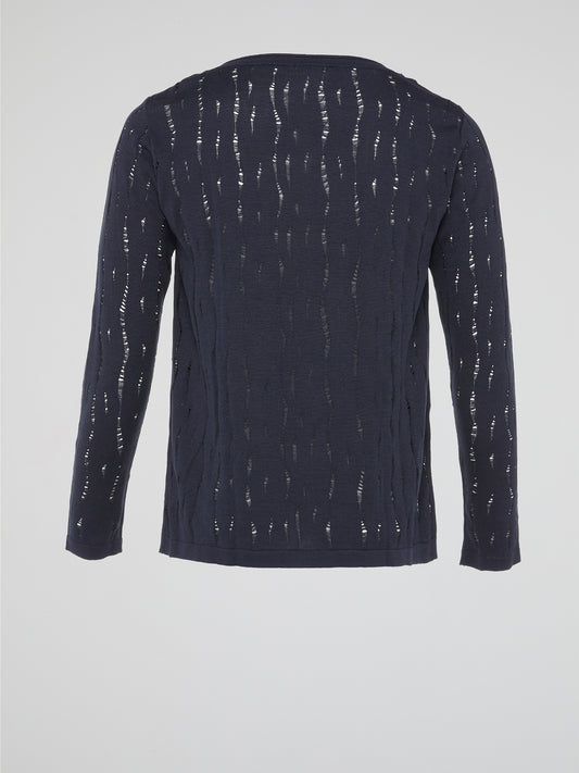 Embrace a touch of urban chic with the Navy Distressed Long Sleeve Top by Roberto Cavalli. This edgy yet sophisticated piece features intricate distressing details and a timeless navy hue, perfect for effortlessly elevating any outfit. Make a bold style statement and stand out from the crowd with this fashion-forward top that exudes confidence and individuality.