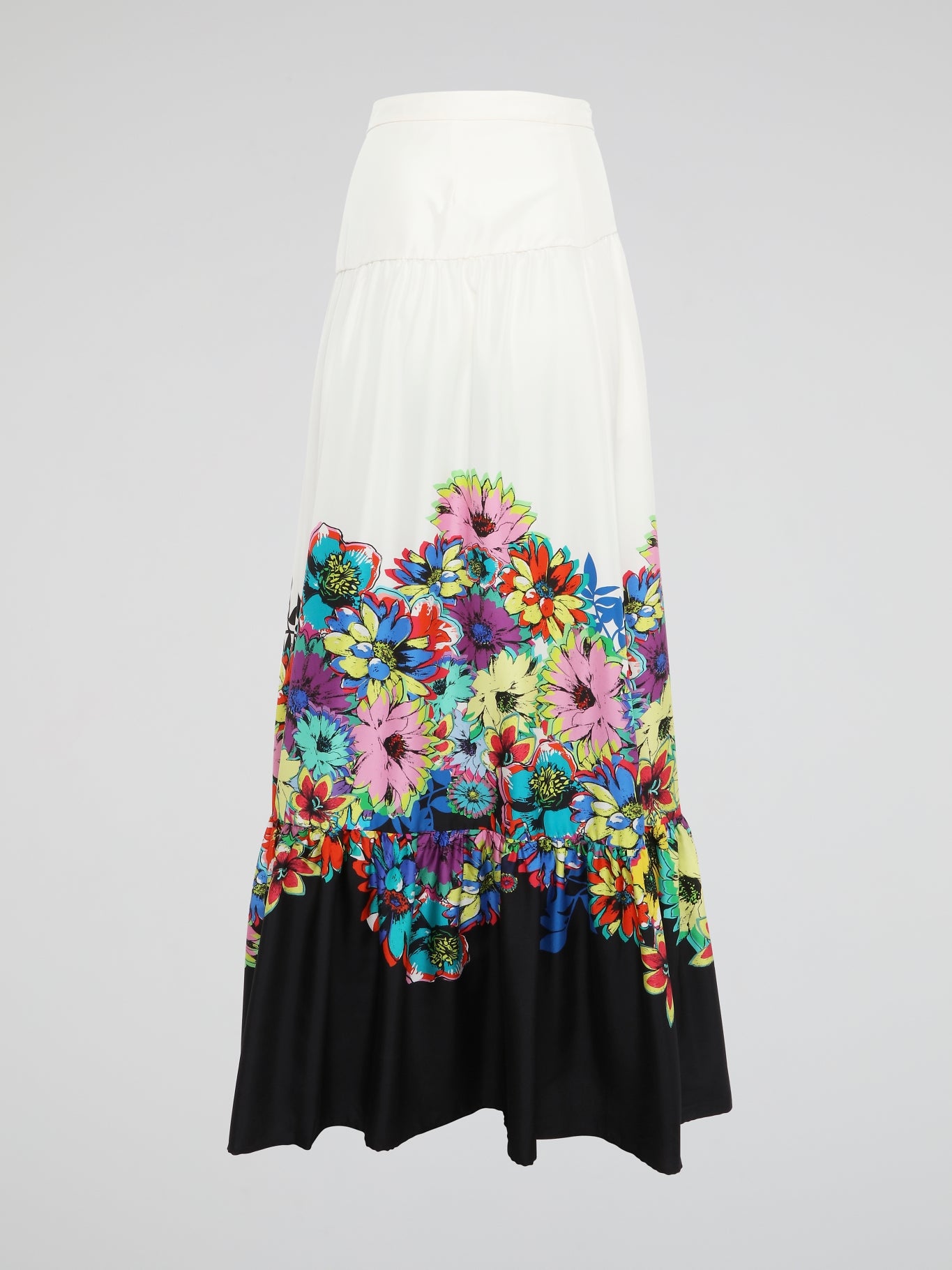 Dance through fields of wildflowers in the Roberto Cavalli Floral Print Maxi Skirt, where whimsical blooms cascade down the flowing fabric like a waterfall of petals. As you twirl and sway in this dreamy piece, the vibrant colors and intricate details will make you feel like a walking work of art. Embrace your inner free spirit and let this skirt be your muse, inspiring envious glances and sparking conversations wherever you go.