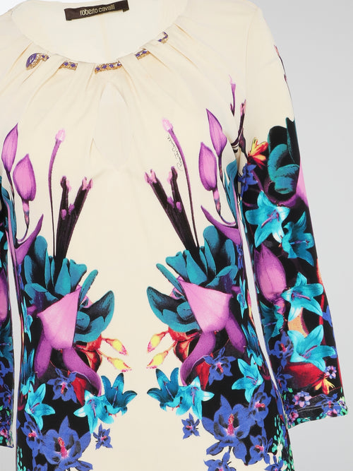 Step into a world of vibrant blossoms with the Floral Print Keyhole Dress by Roberto Cavalli. This exquisite piece transports you to a whimsical garden, where delicate petals dance across the soft fabric, creating a truly captivating ensemble. The keyhole detail adds an alluring touch, ensuring you steal the spotlight wherever you go.