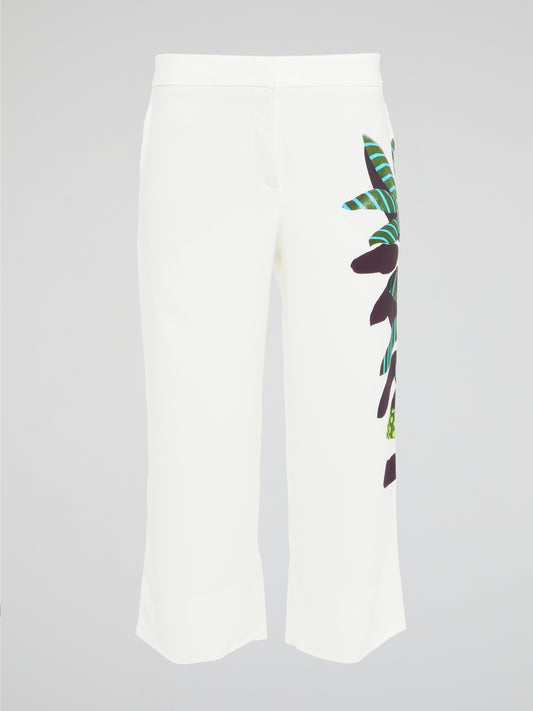 Step into a world of elegance and style with the White Printed Cropped Trousers by Akris Punto. These exquisite trousers feature a unique print that effortlessly combines sophistication with a touch of playfulness. Crafted from premium materials, they offer both comfort and a flattering fit, making them a chic choice for any fashion-forward individual.