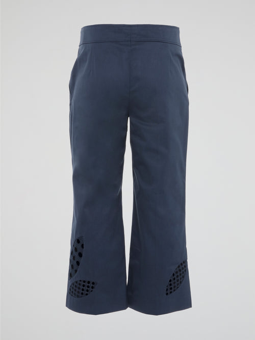 Step into style with these chic Navy Cropped Trousers by Akris Punto. Designed to elevate your everyday wardrobe, these pants boast a flattering cropped silhouette that effortlessly flirts with fashion-forwardness. Crafted with precision, these trousers combine comfort and sophistication, making them a must-have addition to any modern woman's closet.