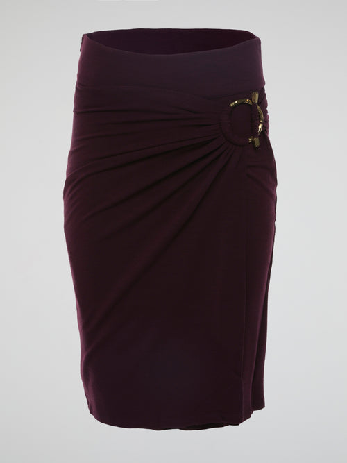 Introducing the Burgundy Draped Skirt by Roberto Cavalli, a graceful masterpiece that effortlessly captivates attention. Crafted with meticulous precision, this luxurious skirt embraces the spirit of elegance, featuring cascading layers that dance with every step. Emanate sophistication and allure as you glide across the room, leaving a trail of admiration in your wake.