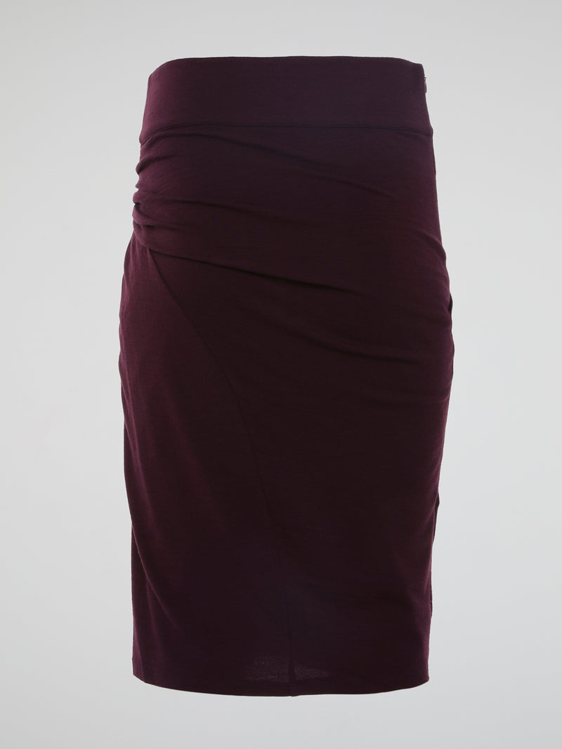 Introducing the Burgundy Draped Skirt by Roberto Cavalli, a graceful masterpiece that effortlessly captivates attention. Crafted with meticulous precision, this luxurious skirt embraces the spirit of elegance, featuring cascading layers that dance with every step. Emanate sophistication and allure as you glide across the room, leaving a trail of admiration in your wake.