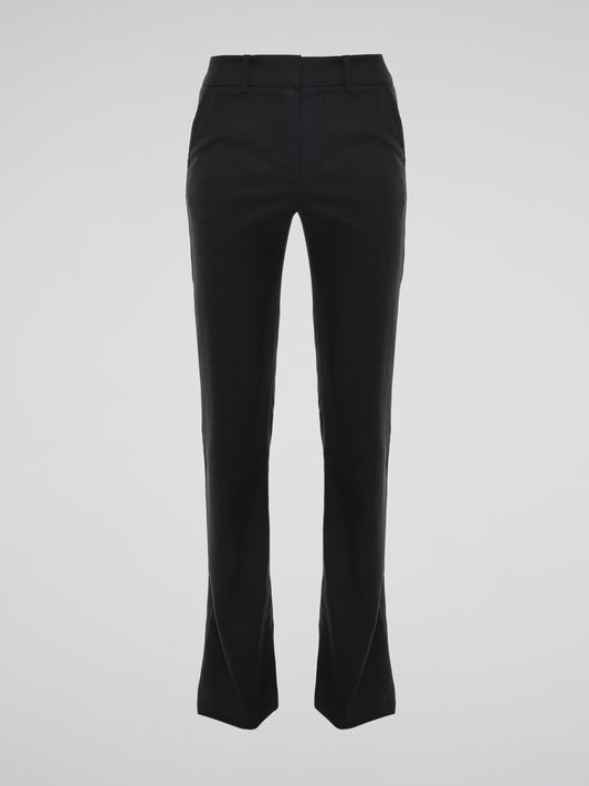 Step out in style and make heads turn with these stunning Black Flared Pants by Roberto Cavalli. Crafted with impeccable precision, these pants exude timeless elegance and are perfect for any occasion. With their flattering fit and luxurious fabric, they effortlessly combine sophistication and comfort, elevating your fashion game to new heights.