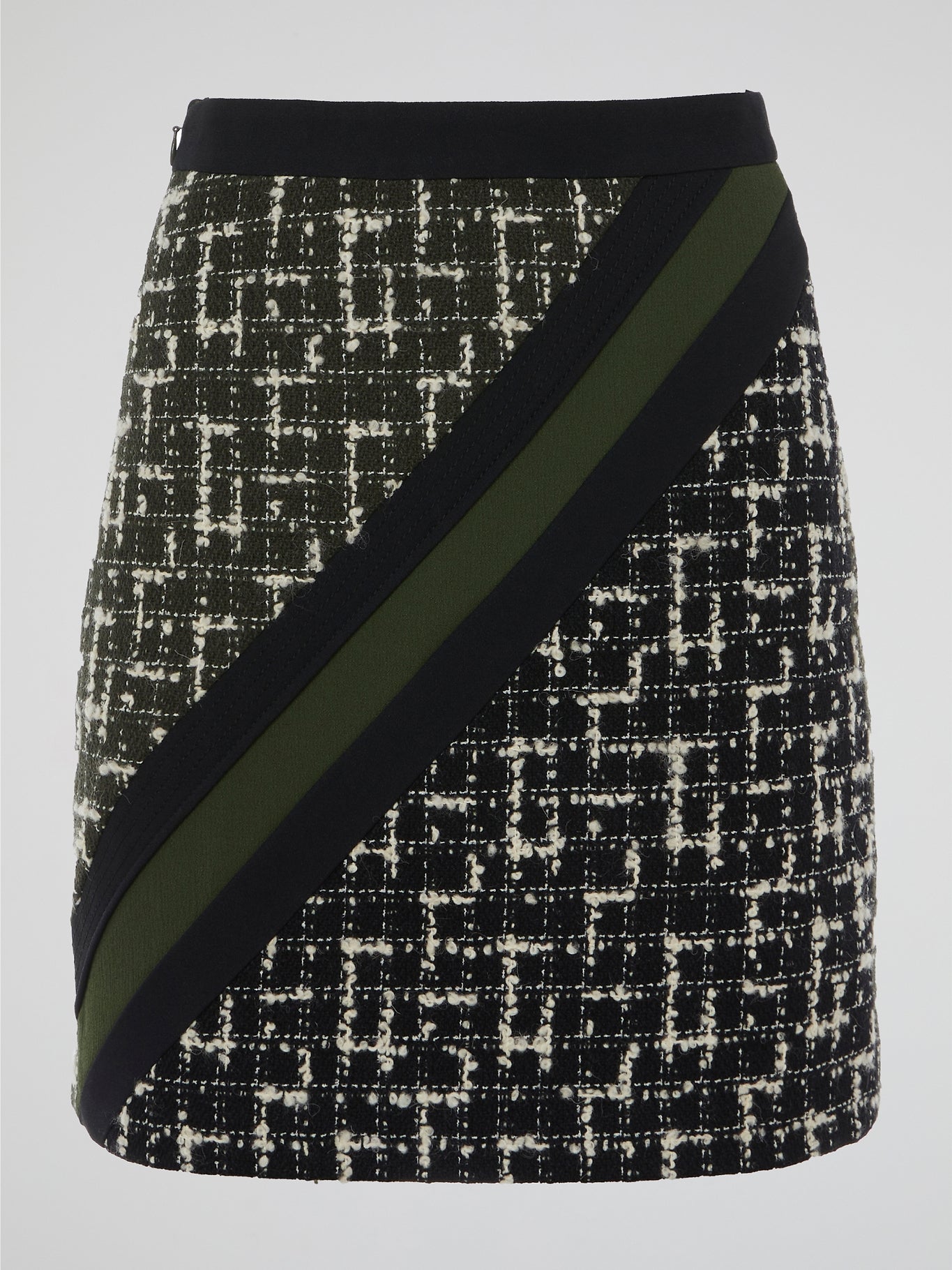 Step into the world of elegance and sophistication with the Tweed Mini Skirt by Emanuel Ungaro. Crafted with the utmost care, this skirt effortlessly fuses timeless style with a contemporary edge. From office meetings to evening soirees, embrace your inner fashionista and make a statement wherever you go with this iconic piece.