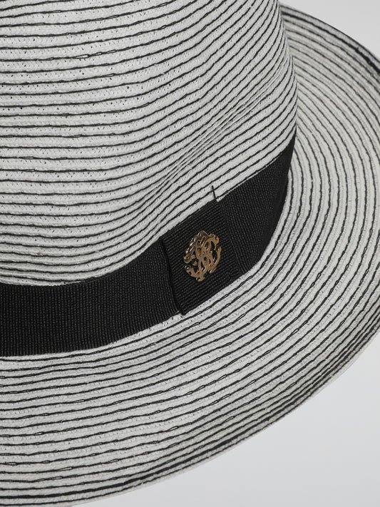 Step out in style with the Striped Bowler Hat by Roberto Cavalli, a perfect blend of sophistication and playfulness. This timeless accessory features bold, eye-catching stripes that will effortlessly elevate any outfit, making a statement wherever you go. Crafted with meticulous attention to detail and Cavalli's signature flair, this bowler hat is a must-have for the fashion-forward individual.