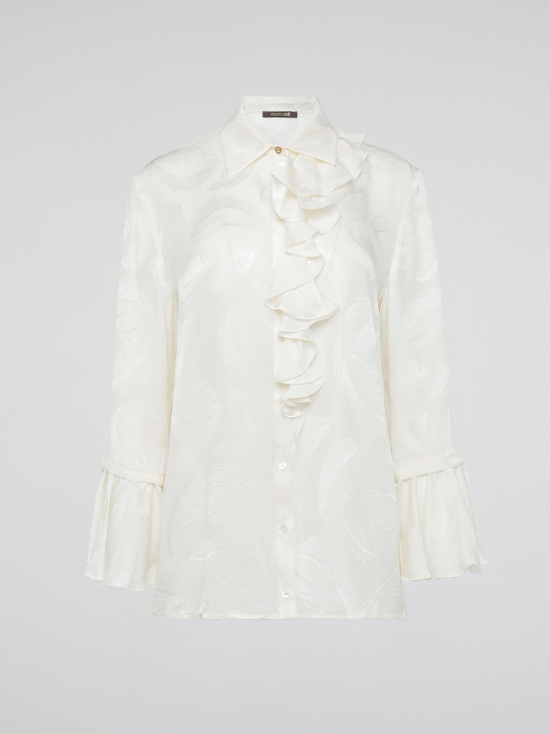 Embrace the essence of high-end fashion with the Ruffle Detailed Shirt by Roberto Cavalli. This stunning piece perfectly combines elegance and playfulness with its intricate ruffles that gracefully dance along the collar and cuffs. Crafted from luxurious materials, this shirt is a true statement piece that effortlessly elevates any outfit.