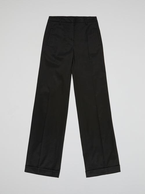 Step up your style game with these sleek and sophisticated Black Straight Leg Trousers by Blumarine. Crafted from premium quality fabric, these trousers are designed to flatter your figure and provide all-day comfort. Perfect for work or a night out, these versatile trousers will have you looking effortlessly chic and stylish.