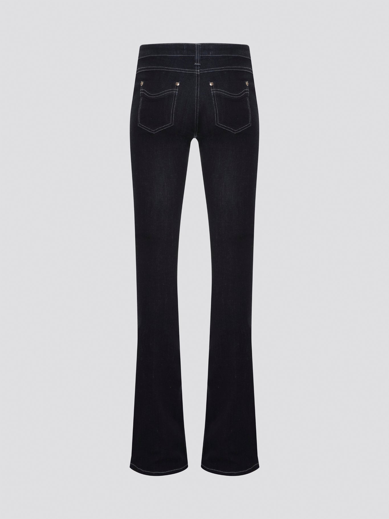 Step out in style with these Roberto Cavalli Black Contrast Stitch Flared Jeans, a modern twist on a classic silhouette. The contrast stitching adds a touch of edge to these sleek black jeans, making them a wardrobe staple for any fashion-forward individual. Pair them with a simple white t-shirt and heels for a chic and sophisticated look that will turn heads wherever you go.