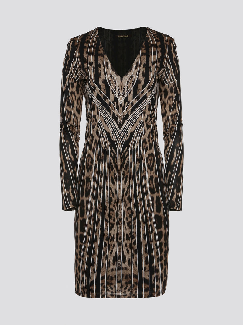 Step into the wild side with our Roberto Cavalli Leopard Print Long Sleeve Dress! This stunning statement piece features a fierce leopard print design that is sure to turn heads wherever you go. Made with high-quality materials, this dress embodies luxury and sophistication, making it the perfect choice for any stylish fashionista. Dress to impress and unleash your inner feline with this captivating Leopard Print Long Sleeve Dress from Roberto Cavalli.