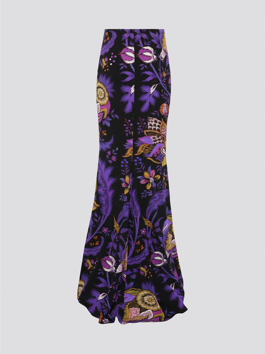 Elevate your style with the stunning Foliage High-Low Maxi Skirt by Roberto Cavalli. Featuring a mesmerizing foliage print and a dramatic high-low hem, this skirt is sure to turn heads wherever you go. Embrace your inner goddess and make a fashion statement that is both elegant and edgy with this one-of-a-kind piece.