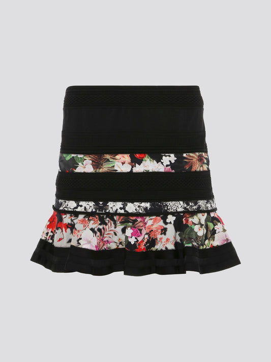 Feel flirty and fabulous in this Print Panel Flared Mini Skirt by Roberto Cavalli. The bold print and flared silhouette add a fun and playful twist to your wardrobe, perfect for making a statement wherever you go. Pair it with a simple top and heels for a chic and stylish look that is sure to turn heads.