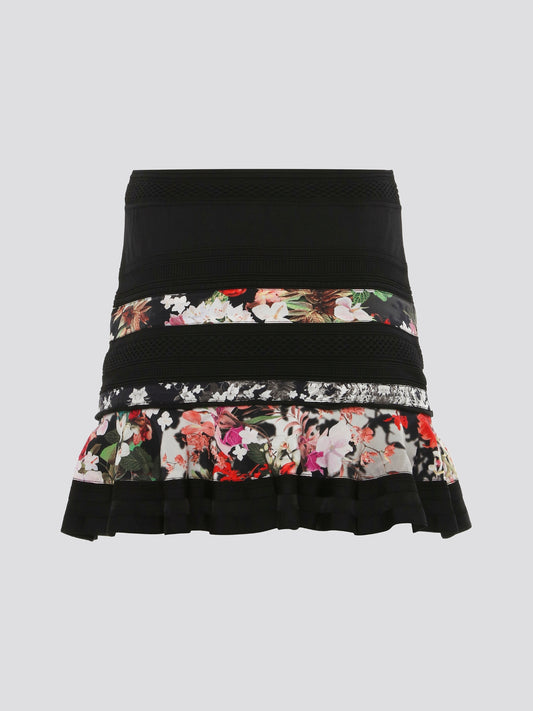 Feel flirty and fabulous in this Print Panel Flared Mini Skirt by Roberto Cavalli. The bold print and flared silhouette add a fun and playful twist to your wardrobe, perfect for making a statement wherever you go. Pair it with a simple top and heels for a chic and stylish look that is sure to turn heads.