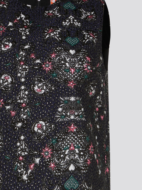 Elevate your summer wardrobe with the exquisite Floral Embroidered Sleeveless Top from Msgm. Delicately crafted with intricate floral stitching, this top effortlessly combines feminine charm with modern elegance. Perfect for both casual outings and special occasions, this top is sure to make you stand out in style.