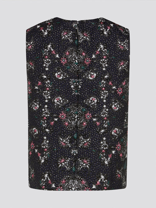 Elevate your summer wardrobe with the exquisite Floral Embroidered Sleeveless Top from Msgm. Delicately crafted with intricate floral stitching, this top effortlessly combines feminine charm with modern elegance. Perfect for both casual outings and special occasions, this top is sure to make you stand out in style.