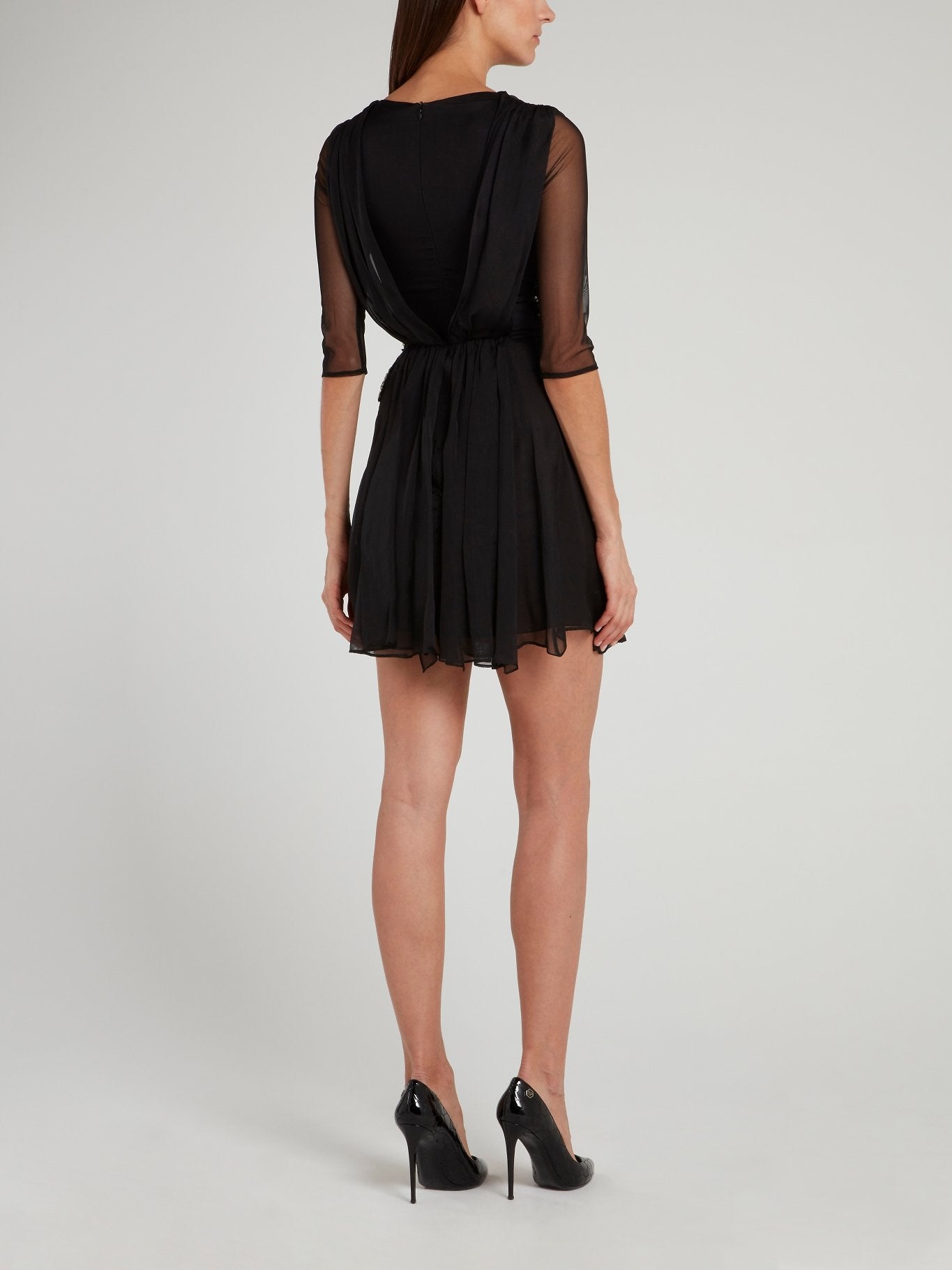 Черное платье-мини с оборками и прозрачными вставками