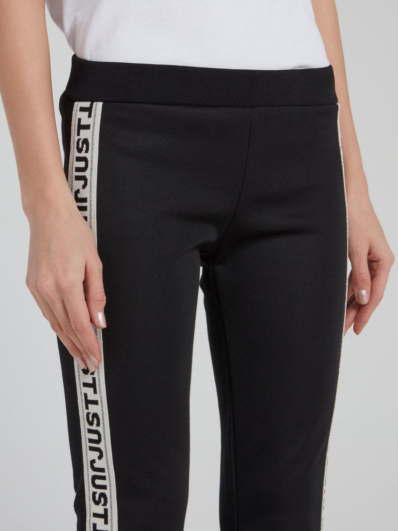 Черные укороченные брюки на резинке с логотипом