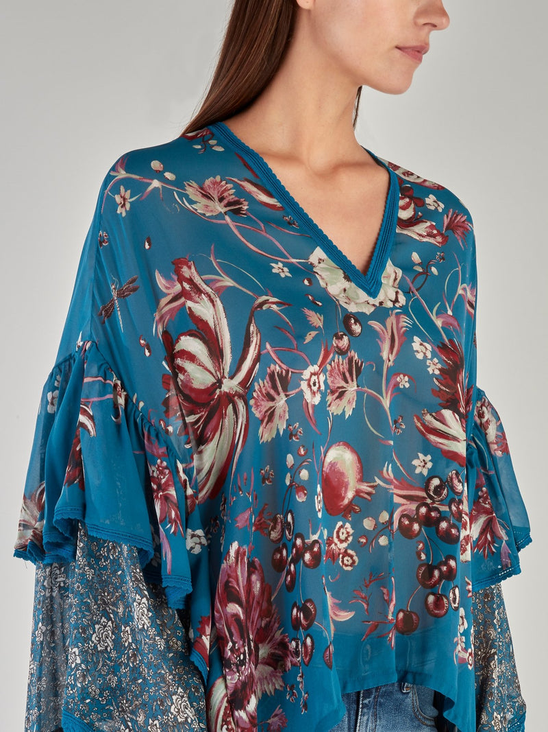 Синяя блузка с цветочным принтом