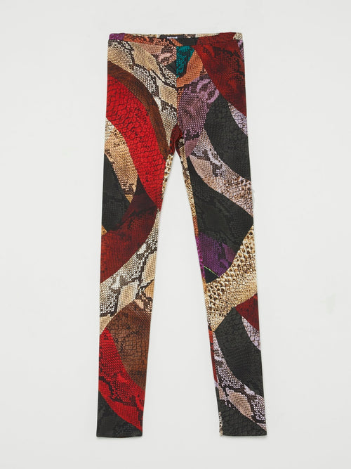Красные брюки в стиле колор-блок со змеиным принтом